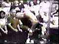 Superstar Billy Graham destroys the WWWF belt after one of Bob Backlund's matches.