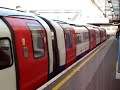 Jubilee line underground train arrives at Neasden station