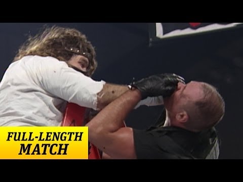 mankind - Nov. 30, 1998 - The Corporation stacks the deck against Mankind as he defends his Hardcore Championship against Big Bossman.
