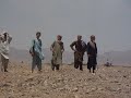 CHILDREN OF AFGHANISTAN AMUSED BY CANADIAN SOLDIERS