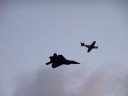F-22 Raptor and P-51 Mustang flying together