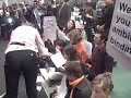 Youth sit in