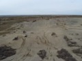 CR250 and KTM400 get big air off a sand dune !
