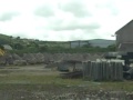 Material from the demolished miners dry and explosive is crushed ready to be recycled around the Heartlands site for paths