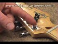 Changing Guitar Strings on a fixed bridge Part 2 of 3 Changing Guitar Strings on a fixed bridge Part 2 of 3