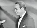 bette davis presenting the best actor oscar� to marlon brando for his performance in 