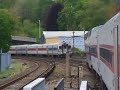We have a southbound train with a conn set at Ossining and then view a northbound bomb train through the end doors of a coach. Metro North hudson line