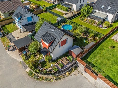 Video Rodinný dům 4+kk s terasou a garáží (131 m2), pozemek 429 m2, Tuřice.