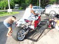 Suzuki Trailer Queen carefully guided on her chariot for the ride back to her garage mahal. Note the air suspension ride height adjustment. The plating shop guy must have retired after this job.