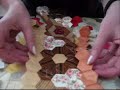 Patchwork  demonstration removing papers from hexagons 3