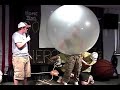 this is a guy who gets inside of a big rubber balloon.  (not from a cell phone, but still cool.)
