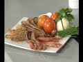 Parrillada de mariscos con ajos fritos y verduras de tempora