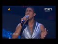 http://i117.photobucket.com/albums/o67/auckland16/album%2001/14cabzc1.png
--------------------------
boaz mauda (hebrew: ???? ??????, b. april 23, 1987) is an israeli singer. he won the fifth season of kokhav nolad, the israeli version of pop idol, and represented israel in the eurovision song contest 2008, finishing in 9th place.
-----------------------------
israel in final:
http://youtube.com/watch?v=ifln-guxzng
boaz audio 'live' 
http://www.mediafire.com/?4lmcbttjxfp
made by me :]
karaoke version:
http://youtube.com/watch?v=v-xcetxiohm

http://escforum.info
my vote ;)good luck israel

all comments with spam will be delete!
(thank u  http://pl.youtube.com/user/marginesik )
hebrew lyrics:
nafshi meyakhelet letfilot halev ha'ham

ze kashe, ze kashe kshega'agua mul yareakh
kan lerega uboreakh, akharav, rodef habekhi
ze kashe, ze kashe kshega'agua mul yareakh
kan lerega uboreach, akharav, rodef habekhi
lifamim mevi haruakh re'akh tov mukar
melatef akhshav shome'a
otkha shar

lo or kochav
ata akhshav
iti iti, keilu amiti
kmo az mizman

come along, come along
see the fire in your eyes
and you come with me, with me
lifamim mevi haruakh re'akh tov mukar
melatef akhshav shome'a

lo or kochav
ata akhshav
iti iti, keilu amiti
kmo az mizman

nafshi meyahelet letfilot halev ha'ham
nafshi meyahelet letfilot halev ha'ham

lo or kochav
iti iti, keilu amiti
kmo az mizman
--------------------------
english translation:
as if here


my soul is hoping for the warm heart's prayers
 
it's hard, it's hard when a longing in front of the moon
is here for a while and than escapes, the crying is chasing after it
it's hard, it's hard when a longing in front of the moon
is here for a while and than escapes, the crying is chasing after it
sometimes the wind brings a good, familiar smell
strokes now, listening
to you singing
 
not a starlight
you are now
with me, with me, as if real
like back than
 
come along, come along
see the fire in your eyes
and you come with me, with me
sometimes the wind brings a good, familiar smell
strokes now, listening
 
not a starlight
you are now
with me, with me, as if real
like back then
 
my soul is hoping for the warm heart's prayers
my soul is hoping for the warm heart's prayers
 
not a starlight
with me, with me, as if real
like back then
------
polish translation:
(thx: http://pl.youtube.com/user/zanetkaoo )
moja dusza ma nadzieje na ciep?ego serca modlitw?

to trudne,to trudne kiedy t?sknie przed ksi??ycem
jest tutaj przez chwilk? i potem sie uwalnia, p?acz goni za nim
to trudne,to trudne kiedy t?sknie przed ksi??ycem
jest tutaj przez chwilk? i potem sie uwalnia, p?acz goni za nim
czsami wiatr przynosi dobre, znajome zapachy 
wylew teraz, s?uchaj?c
do ty ?piewaj

nie gwiezdna
ty teraz jeste?
ze mn?, ze mn? ,jakby naprawde
jak wcze?niej przedtem

przyjdz, przyjdz
zobacz ogie? w twych oczach
i chodz ze mn?,ze mn?
czsami wiatr przynosi dobre, znajome zapachy 
wylew teraz, s?uchaj?c

nie gwiezdna
ty teraz jeste?
ze mn?, ze mn? ,jakby naprawde
jak wcze?niej przedtem

moja dusza ma nadzieje na ciep?ego serca modlitw?
moja dusza ma nadzieje na ciep?ego serca modlitw?
nie gwiezdna
ze mn?, ze mn? ,jakby naprawde
jak wcze?niej przedtem