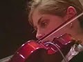 david mills, from neighborhood music school, trains a talented group of string players to perform with jazz great ahmad jamal.