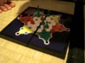 videos de Ella's first chinese checkers