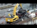 CAT 385C excavator loading a dump truck [HD]