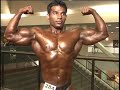 Bodybuilder Shoaib Zahor hits some poses backstage at the 2008 Musclemania Universe competition.