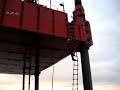 Rope ladder climb to drilling rig Rope ladder climb to drilling rig