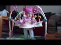 Bebe playing in her bouncer.