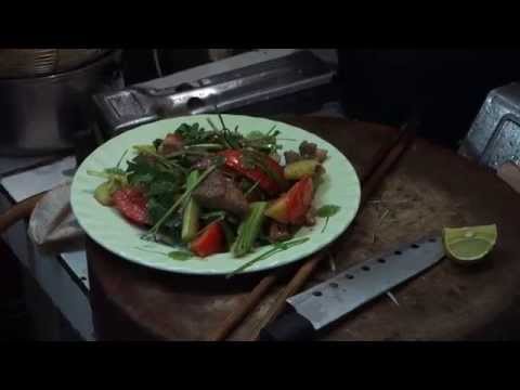 Fried liver with tomatoes and cucumber