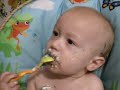 Noah eating b -day cake