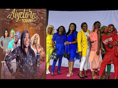 Funny! Funke Akindele With Her Aiyetoro Town Gals At Step Out In Multi-colour Dress At The Premiere