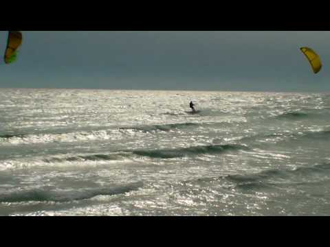 Kiteboarders ride St. Andrews State Park in Panama City beach