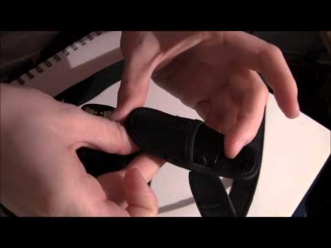 how to attach the strap on a canon camera