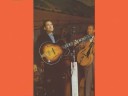 skeeter davis - my heart's in the country (1966)

photos: jim reeves, anita kerr, chet atkins, bobby bare, brenda lee, bill monroe, buck owens, mother maybelle carter and the carter sisters, wanda jackson, grand ole opry entertainers 1960-1961, don gibson, dolly parton, dottie west, del wood, eddy arnold, ernest tubb, everly brothers, george jones, hank williams, skeeter davis, june carter, johnny cash, jean shepard, kitty wells, lefty frizell, loretta lynn, merle haggard, louvin brothers, minnie pearl, marty robbins, patsy cline, dolly parton and porter wagoner, elvis presley, waylon jennings, willie nelson, tammy wynette

my heart's in the country
(larry kingston - felton jarvis)
 
my heart's in the country and i'm going back
my name is on the sign up front in flashing pretty lights
hundreds of people pay to see me every night
and after each show they beg me for my autograph
they all think i'm happy oh what a laugh

yes my heart's in the country on a farm in ohio
with my mama and daddy and the only friends i know
there's a strange different yearning for a farm boy named jack
yes my heart's in the country and i'm going back

oh i've had my fill of the big towns and all the glaring neon lights
i'd give anything to sit by daddy's fireplace late tonight
and just once more if i could hear in place some old tune on his violin
there'll be no show for me tonight cause i'm going home again

yes my heart's in the country on a farm in ohio...
yes my heart's in the country now i'm going back
**********
