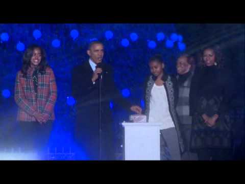 national - President Barack Obama has thrown the switch, bathing the National Christmas Tree in lights and giving an otherwise dreary day in the nation's capital a fest...