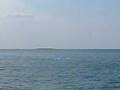 Picking up swimmer who went ahead as we left Thai National Marine Park