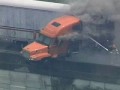 Truck Catches Fire, Hangs On Overpass