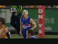 Adam Cooney out-rucking Dean Cox