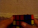 solving the first layer of a rubicks cube