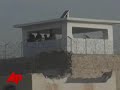 Hundreds Escape in Taliban Prison Attack
