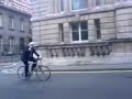 Boris Johnson rides his bike while using a mobile!