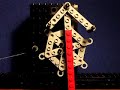 Dead-beat escapement; the rounded ends of the 6 spokes provide the profile needed for the impulstransfer; an L-shaped end is not necessary.Part of series W1 thru W12.