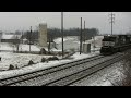 HD Available: 6 trains in a winter ice and snow scene... on January 7, 2009: 14G passes MP 76.7 with K5LLA sounding for the crossing, NS SD70M-2 2766 NS D9-40CW 9065 NS SD60I 6736 As power, and 16T comes later than evening through HP 77.5 with a blue pair! NS D8-40C 8303 