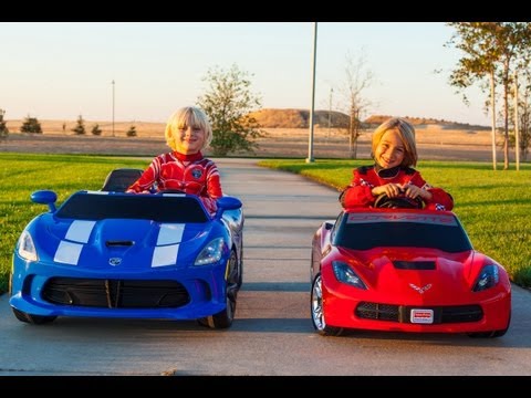 Racing wheels - Two of the latest and coolest kids ride on electric cars go head-to-head in this 3-heat auto race! The new Fisher-Price Power Wheels 2014 Corvette Stingray g...