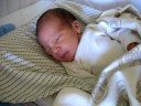 Sebastian cracking his first smile