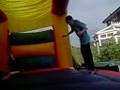 Josh Fliping Off The Trampoline On To The Bouncy Castle.