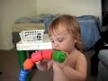 Early sign of autism- preoccupation with part of a toy Early sign of autism- preoccupation with part of a toy