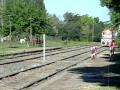 Tren de NCA con Loc. 6634 y Loc. 8232 por Antártida Argentina (Ex Fisherton).-
