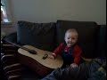 Joon chases Ophelia, plays guitar, giggles.