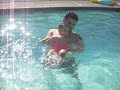 aleyah swimming with daddy