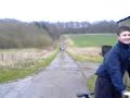 Biking down the hill in highway Biking down the hill in highway