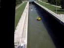 Hovercrafts wave out from lock