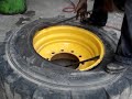 Backhoe tire dismounting 19.5 L-24