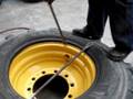 Backhoe tire dismounting 19.5 L-24