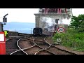 Steam Train Erupting From A Tunnel